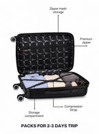 VELTRIX Black suitcase interior with compression straps and zipper mesh pocket